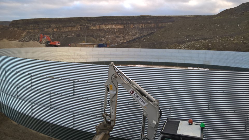 Photo of a steel tank in a costruction site