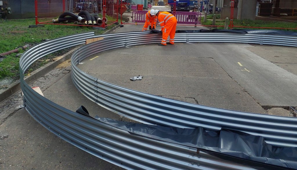 Men Installing Tank